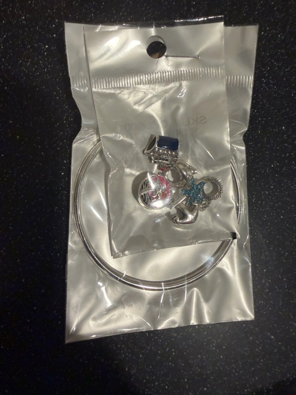 Silver Tone Bangle Bracelet with 5 cruise ship themed charms! NWT